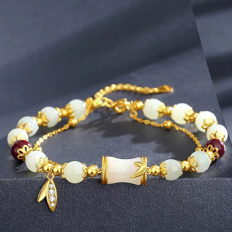 Glass and coloured glaze bracelet with floral design and ruyi elements in retro style