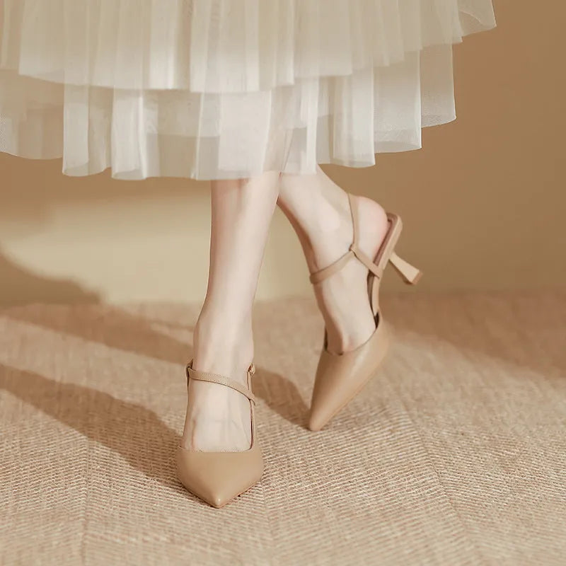 Solid colour women's pointed stiletto heel pumps with imitation sheepskin lining available in apricot brown and black