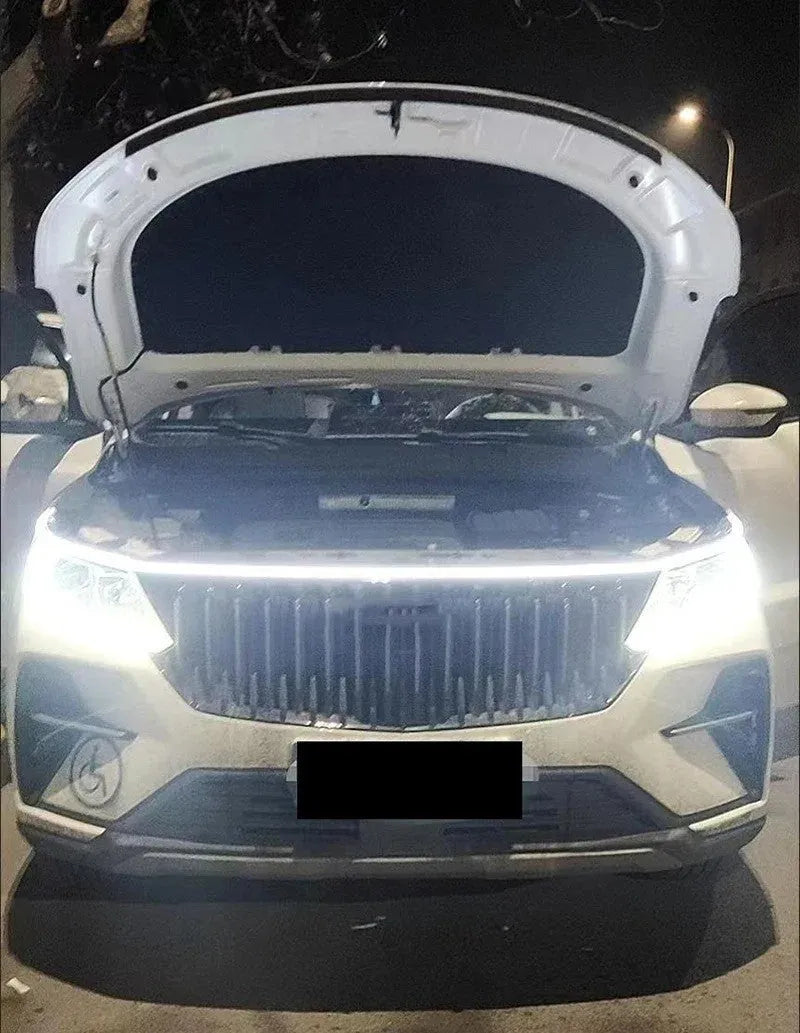 Car interior LED strip light with scanning effect in ice blue colour, showing flexible silicone construction