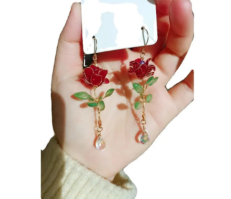 Red flower-shaped liquid ornament earrings with tea fragrance for women