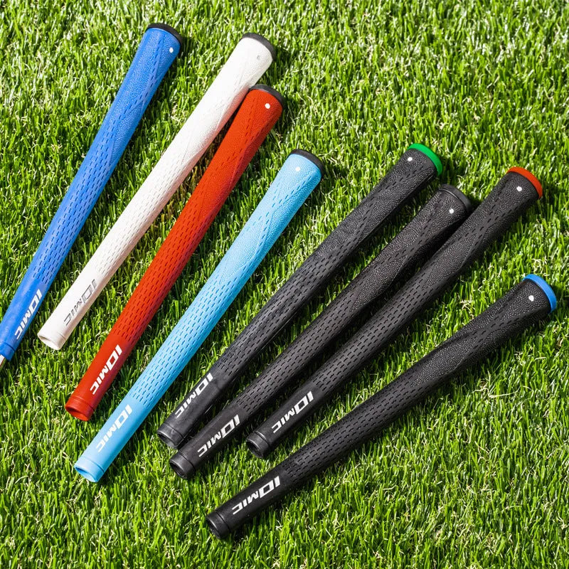 TPE golf grip in multiple colours including pink, blue, and black with red head on a club shaft