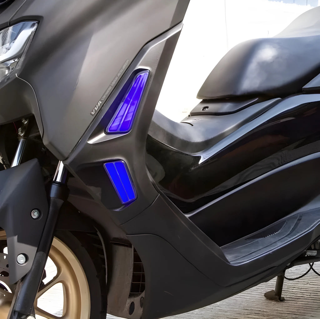 Pair of LED turn signal lights for Yamaha NMAX 155 scooter, showing colour options on a white background.