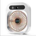 Green and white USB rechargeable portable desk fan with misting humidifier function and adjustable wind direction.