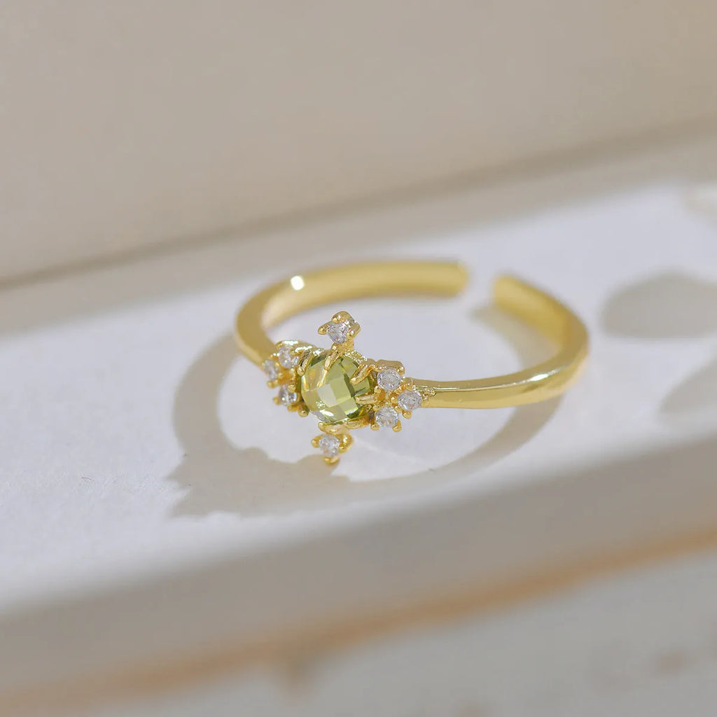Geometric open mouth women's ring with zircon stones in olive green or purple on copper band