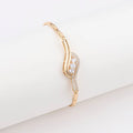 18K gold-plated butterfly clover brass bracelet with zircon stone on plain background