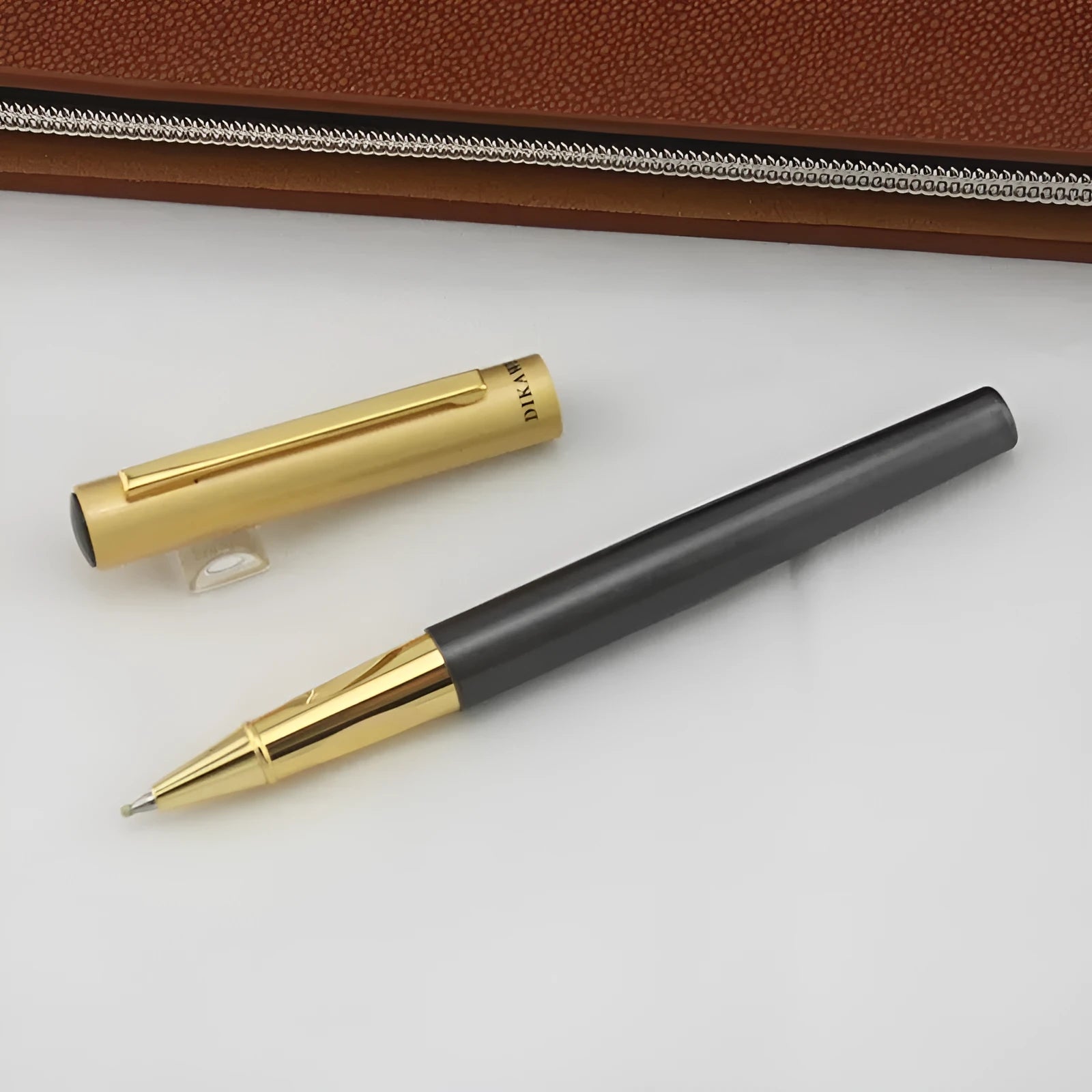 Baozhu pen with metal shell shown in seven colour options including coffee, purple, grey, and black.