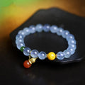 Iced aquamarine crystal bracelet with 8mm geometric beads and retro ethnic styling details
