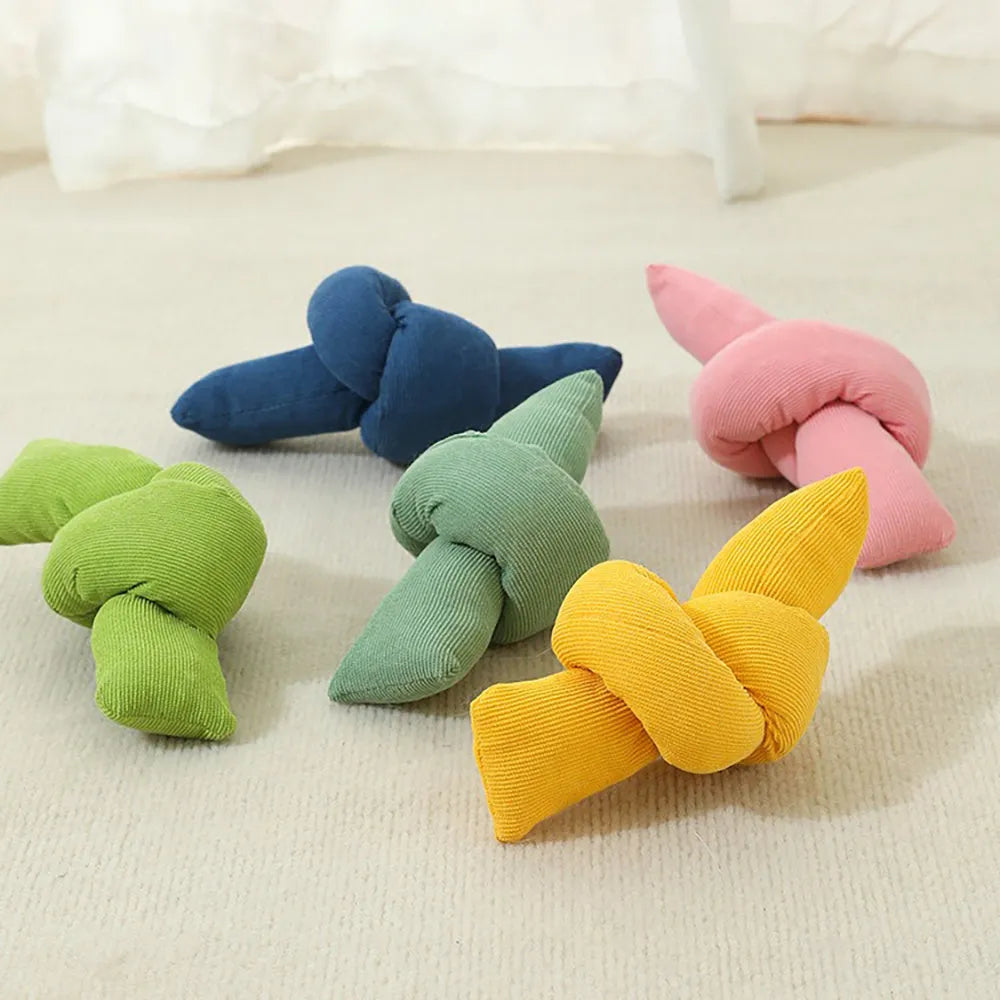 White cotton dog rope toy with multiple knots for tug of war and chewing