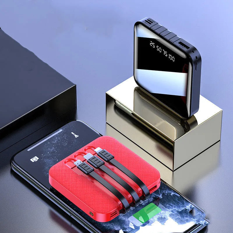 Mirror-finished black power bank with built-in USB cable showing compact 80x80mm size