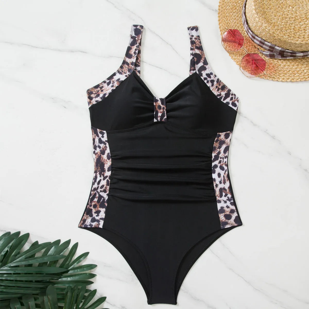 Women's one-piece swimsuit in leopard print with green contrast colour, polyester fabric, available in sizes S to XL