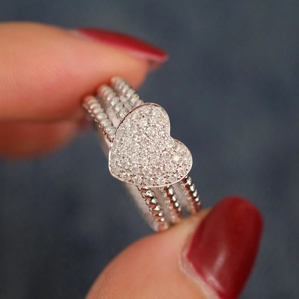 S925 sterling silver twisted heart ring for women, electroplated white gold finish, US size 7.