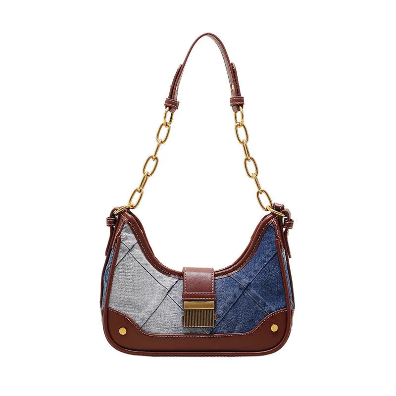 Brown denim women's bucket shoulder bag with diamond mesh detail and a chain strap.