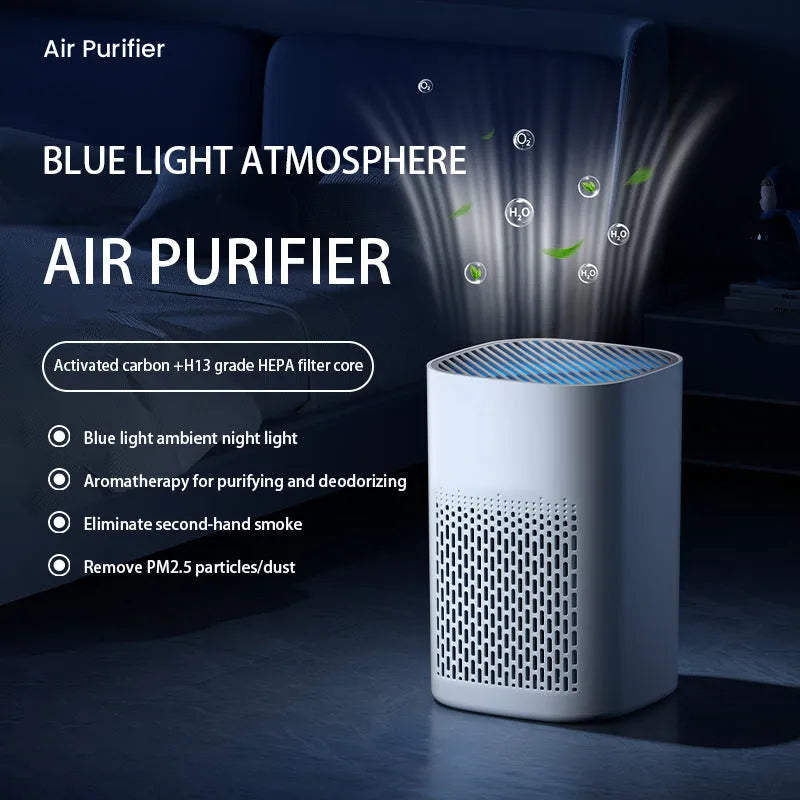 Compact desktop USB air purifier deodoriser with simple modern design on a desk.