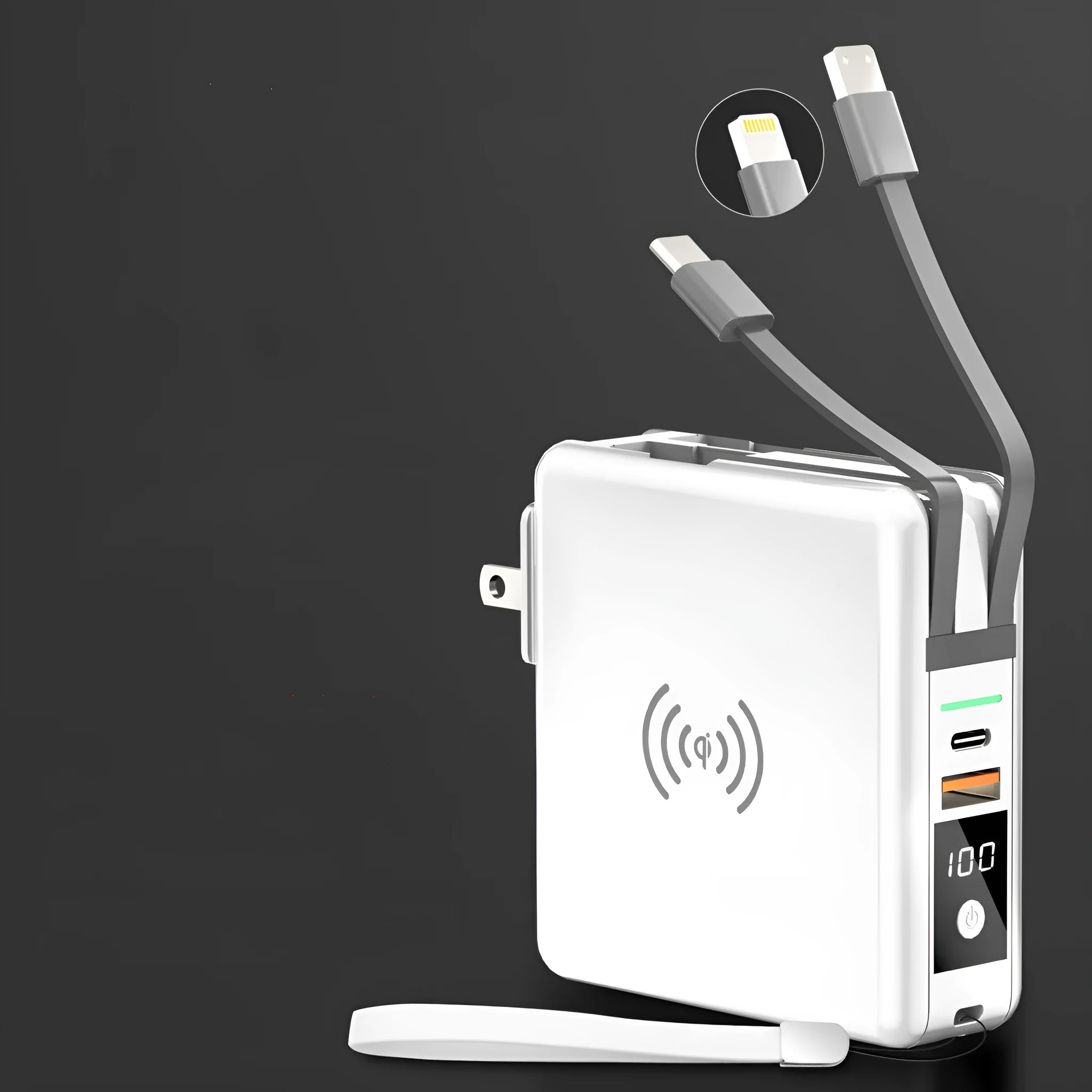 Black Super QI wireless power bank with integrated folding plug shown on a table next to a smartphone.