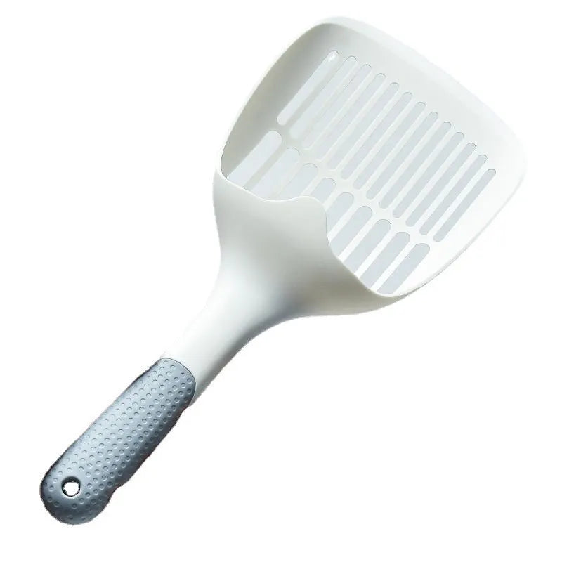 White plastic cat litter scoop with an attached storage base on a white background.