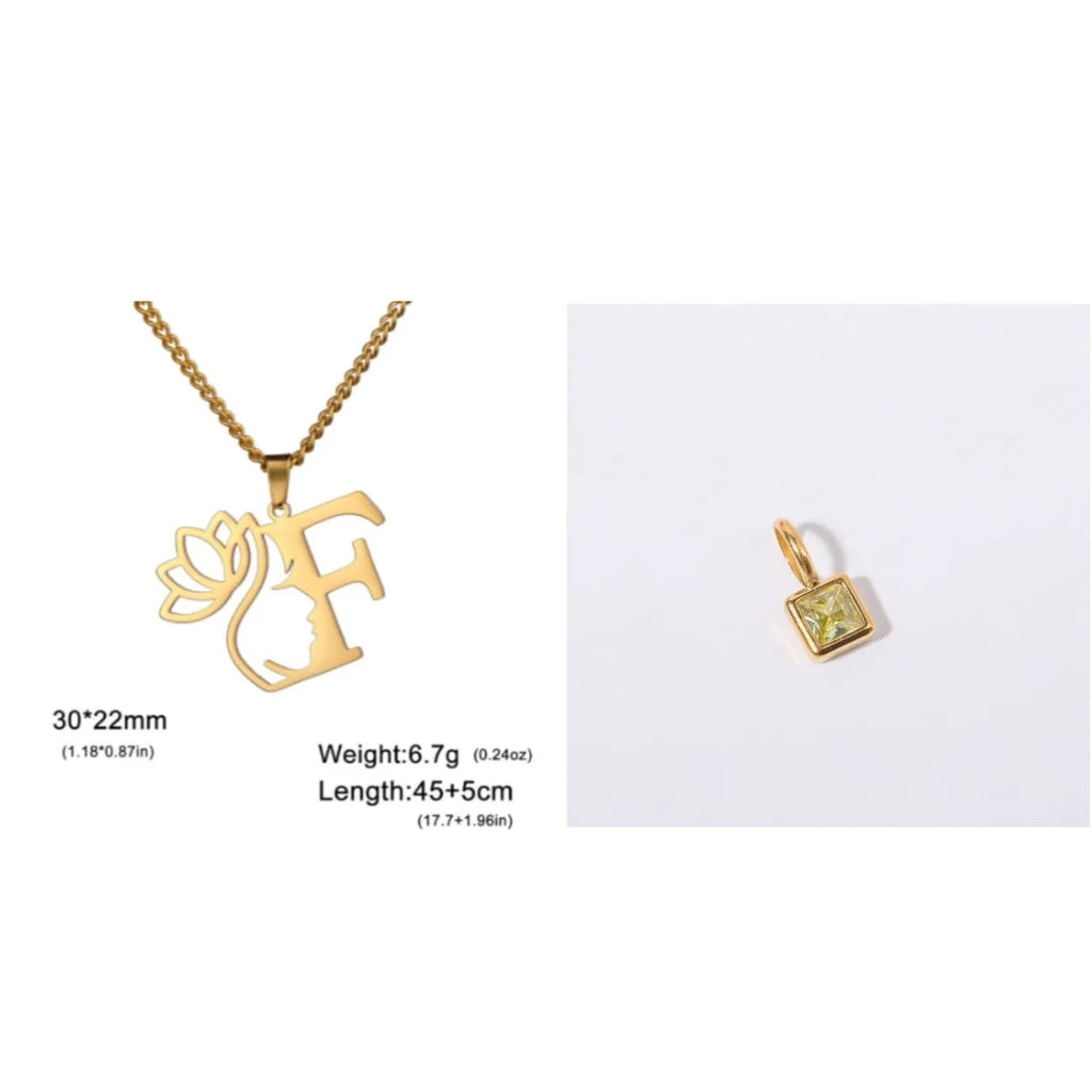 Gold electroplated stainless steel necklace with a cross chain and a letter 'A' pendant on a white background.