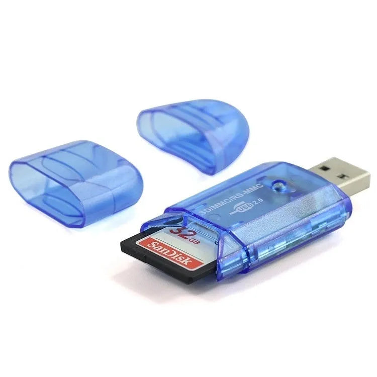 Transparent plastic USB card reader with LED light option on a desk next to memory cards.