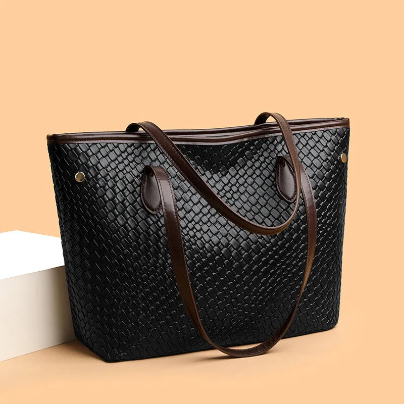 Retro women's large capacity commuter handbag in black or brown with sandwich pocket design