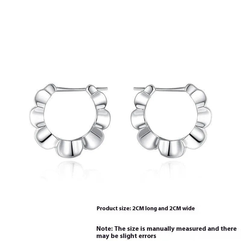 Pair of sterling silver geometric earrings with retro style and round elements