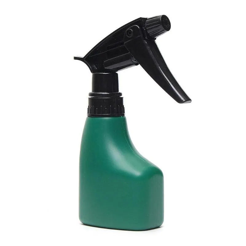 Camouflage garden tool set with two shovels, rake, scissor, kettle, and spray bottle in a green plastic case
