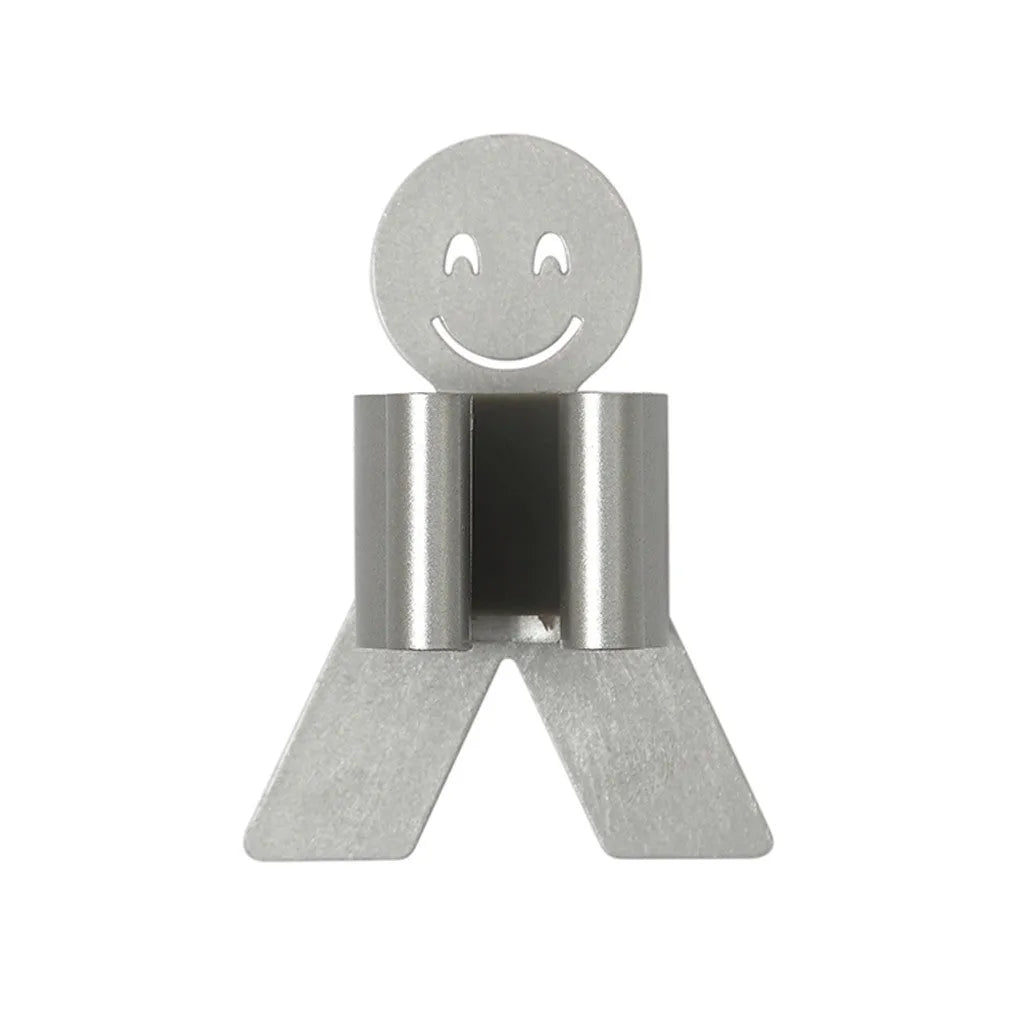 White bathroom toilet mop hook with adhesive backing for wall mounting, holding a toilet brush handle