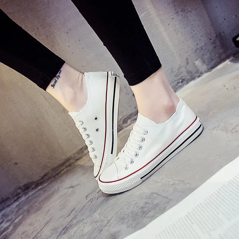 Women's solid-colour canvas shoes in black, white black, white red, or all black colour options