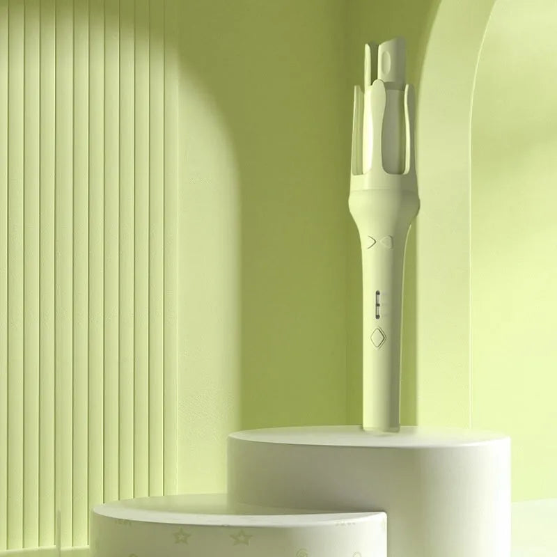 White and pink automatic hair curler with a rotating 32mm ceramic barrel and international plug adapters.