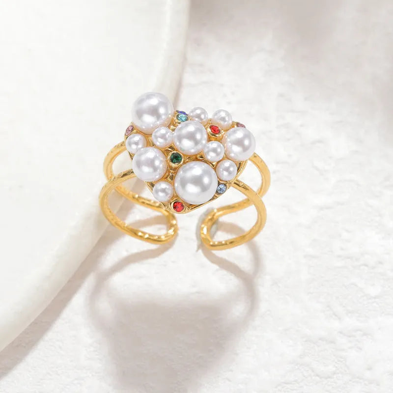 Women's adjustable open-mouth ring in stainless steel with pearl decorative elements