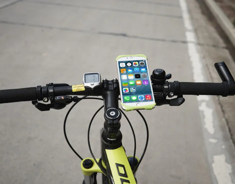 Black silicone bicycle phone holder mounted on handlebars showing three-hole adjustable bracket