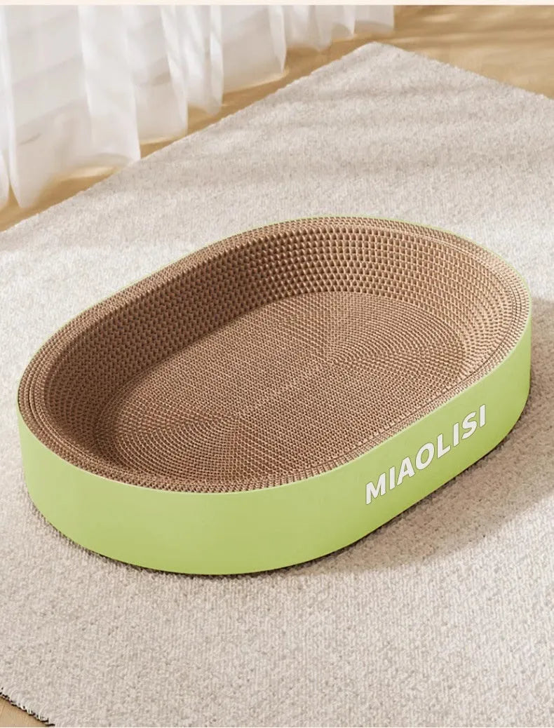 Green oval corrugated paper cat scratch board nest with a 55cm diameter.
