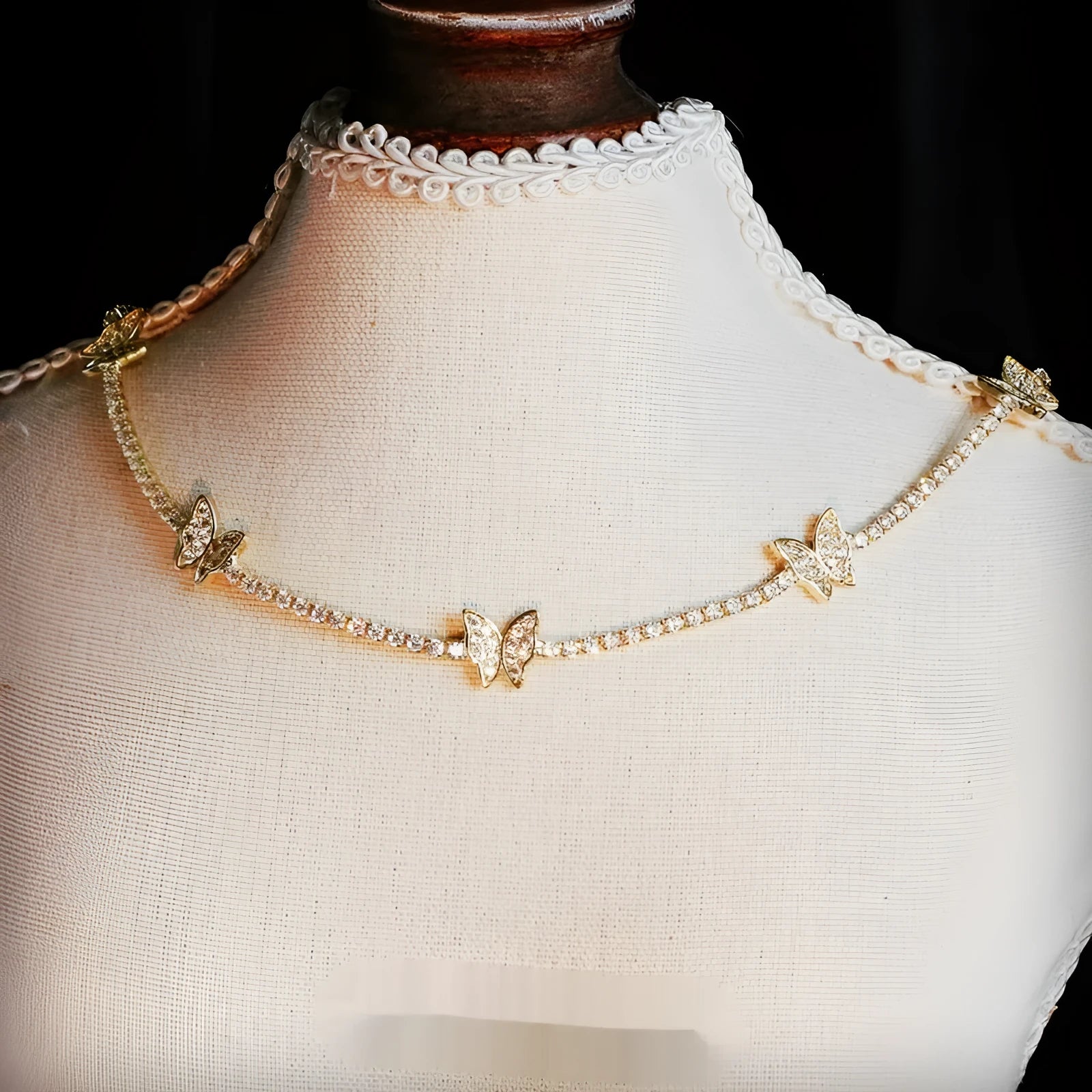 Gold alloy butterfly pendant necklace with zircon stones on adjustable chain from 21 to 50cm
