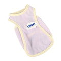 Grass green lightweight polyester vest for cats on a grey background, showing front hook-and-loop closure.