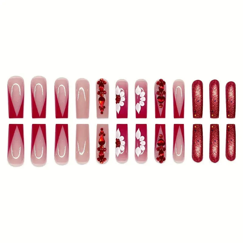 Artificial nails with floral pattern and red diamond accents in European square shape