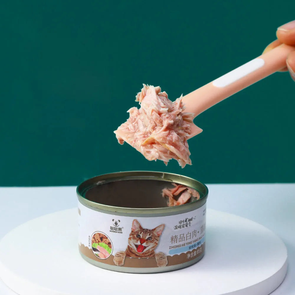 Green long-handled pet food spoon for canned wet food with right-angle design