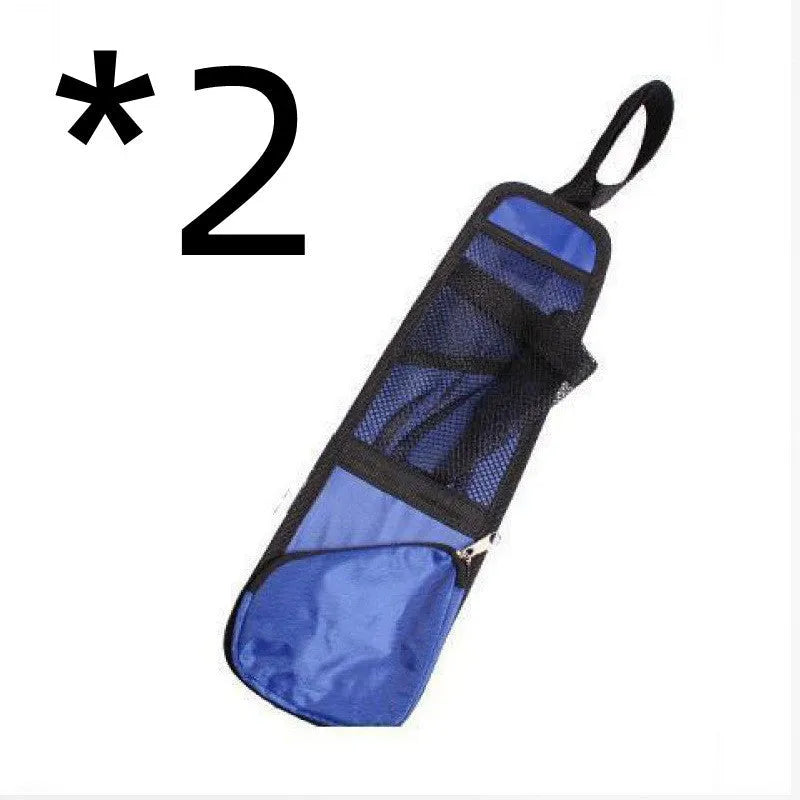 Black nylon car chair side bag with compartments for drinks and phone, attached to vehicle seat