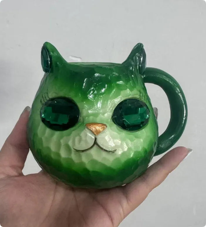 Resin Crystal Earth Cat Cup decorative ornament in purple, green, blue, and pink colour options.