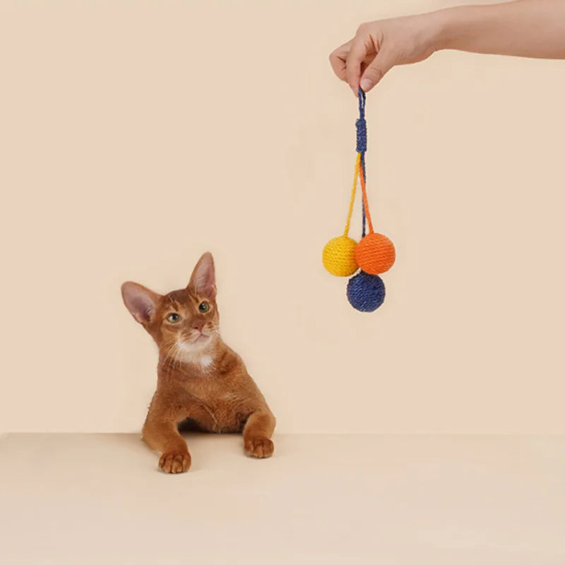 Interactive cat teaser wand with a colourful bite-resistant catnip ball attached