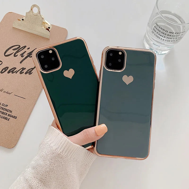 Solid colour TPU phone case for iPhone shown in blue, claret, pink, and green options