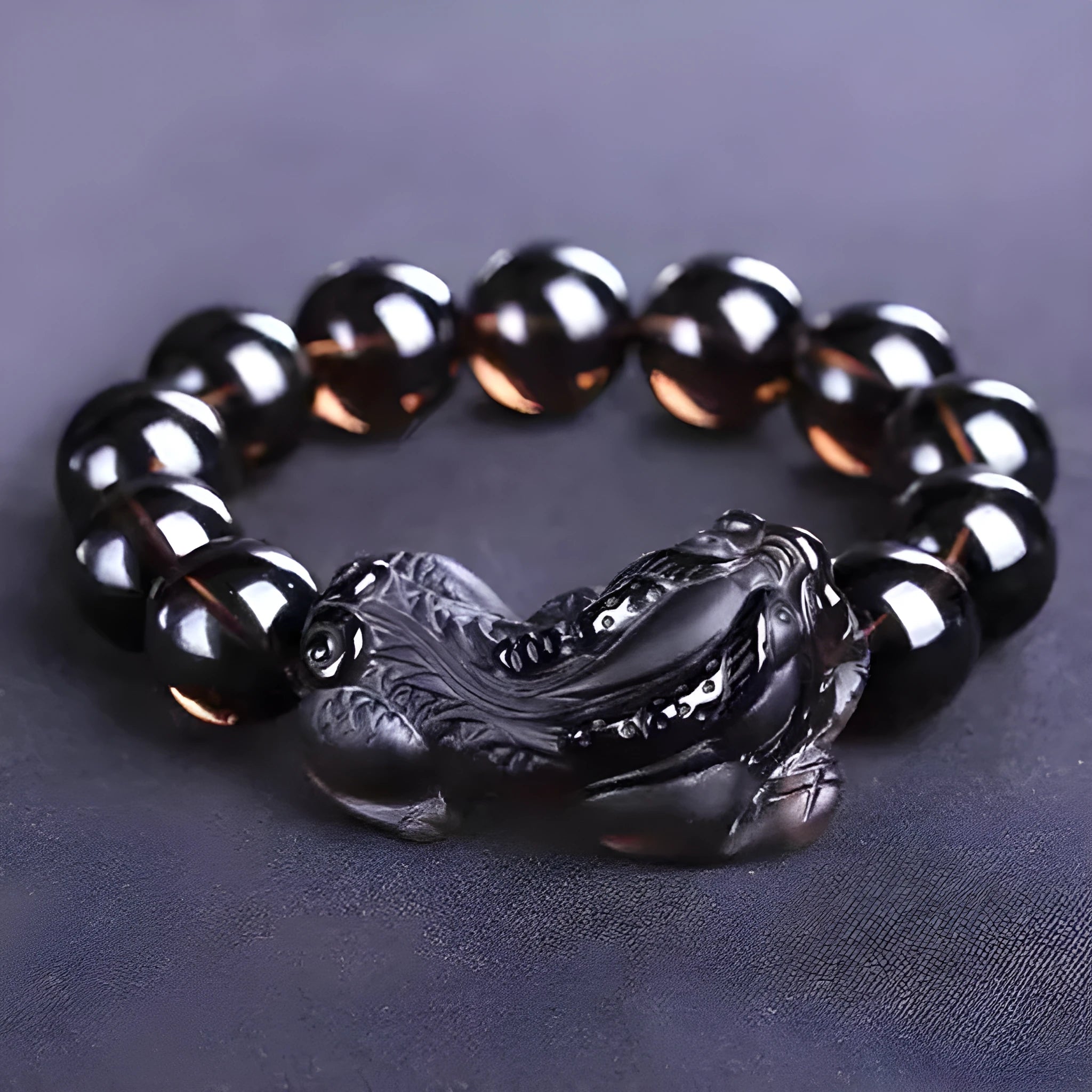 Kaiguang natural ice species black anthracite raspberry stone beaded bracelet on a plain background