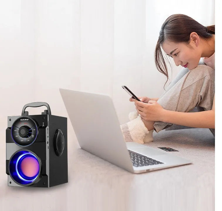 Black portable mini 2.1 channel home audio system with subwoofer, cable, and USB power