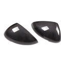 Pair of real carbon fibre rearview mirror covers for Porsche Macan, showing black woven texture.