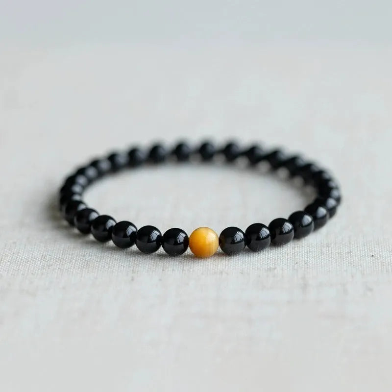 Korean-style geometric obsidian bracelet with natural eye pattern stones