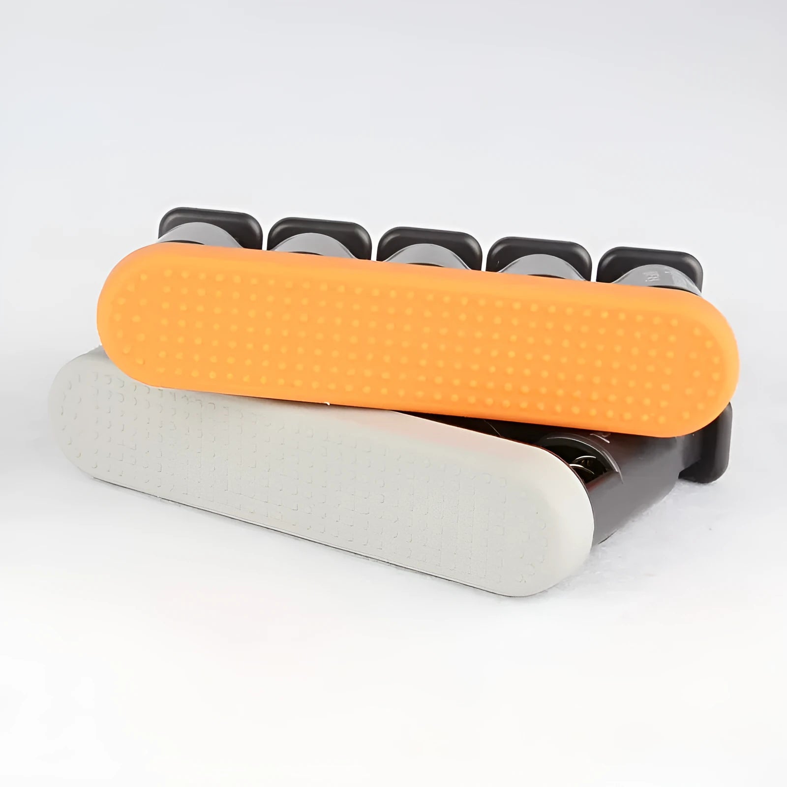 Grey and orange non-slip silicone finger trainer for hand strength exercises