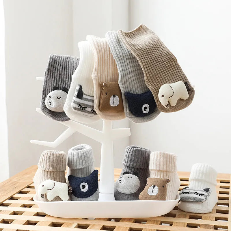 Non-slip baby socks with dispensing glue feature in cotton material, showing mid-calf height and colour options