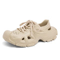 Men's black lace-up sports sandals with EVA sole and round toe on a neutral background.