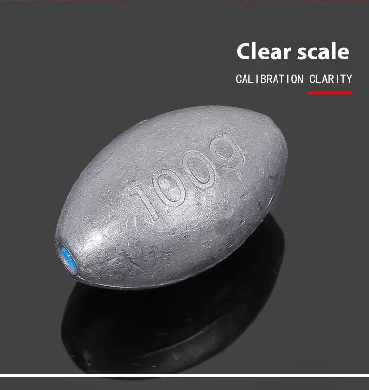 Olive-coloured rugby-shaped sea fishing sinker with a textured scale pattern, showing weight markings.