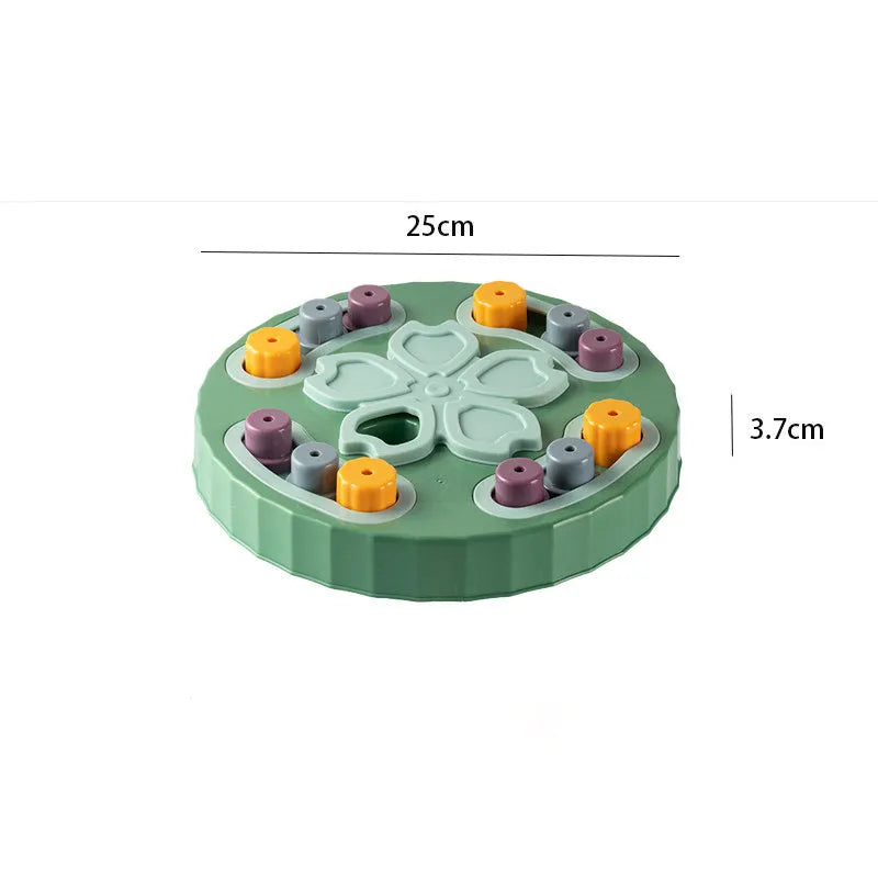 Blue interactive dog slow feeder toy with rotating central pillar on a non-slip base