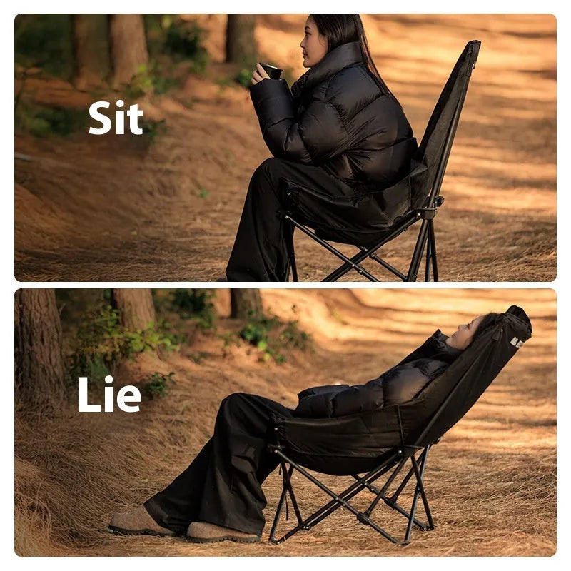 Night Black portable folding moon chair with Oxford cloth upholstery set up outdoors