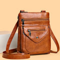 Vertical square-shaped crossbody phone bag in PU leather available in four colours