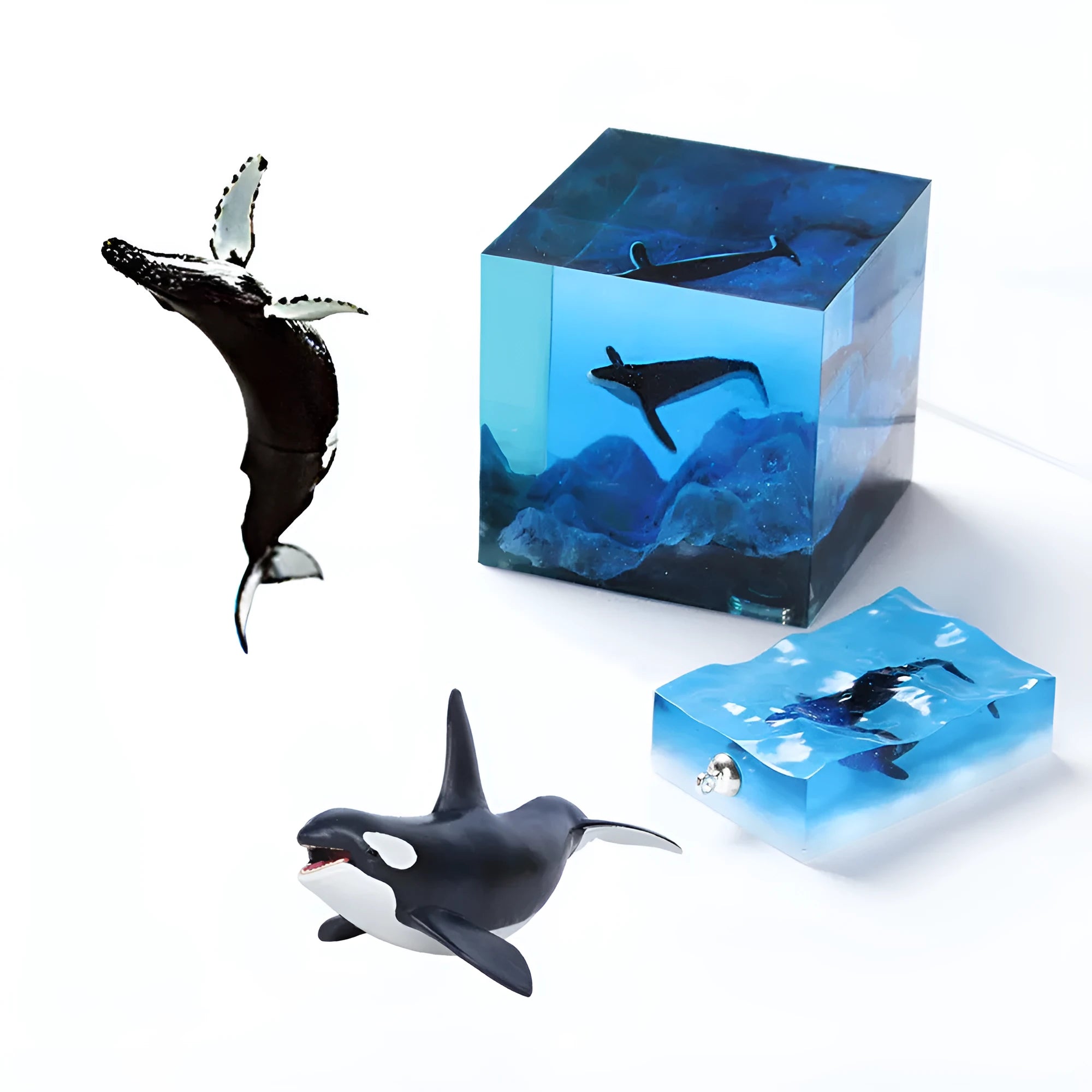 Plastic crystal glue ocean whale model in jump water humpback pose